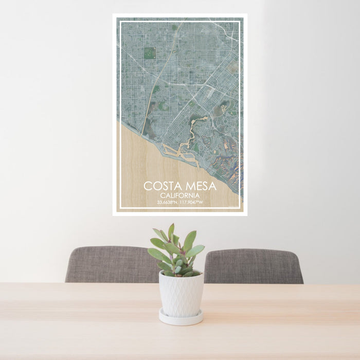 24x36 Costa Mesa California Map Print Portrait Orientation in Afternoon Style Behind 2 Chairs Table and Potted Plant