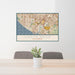 24x36 Costa Mesa California Map Print Lanscape Orientation in Woodblock Style Behind 2 Chairs Table and Potted Plant