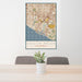 24x36 Costa Mesa California Map Print Portrait Orientation in Woodblock Style Behind 2 Chairs Table and Potted Plant