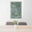 24x36 Council Bluffs Iowa Map Print Portrait Orientation in Afternoon Style Behind 2 Chairs Table and Potted Plant