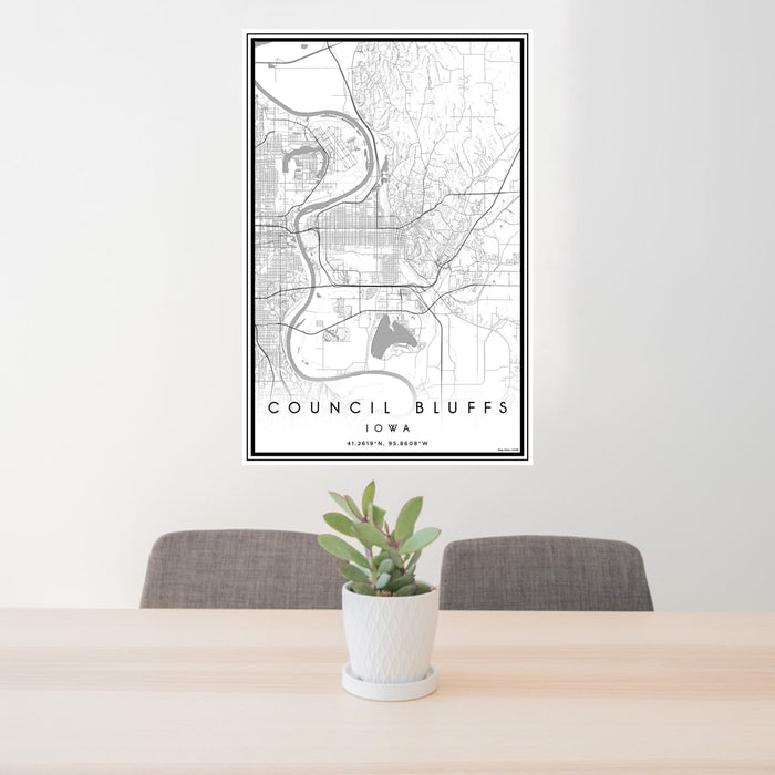 24x36 Council Bluffs Iowa Map Print Portrait Orientation in Classic Style Behind 2 Chairs Table and Potted Plant