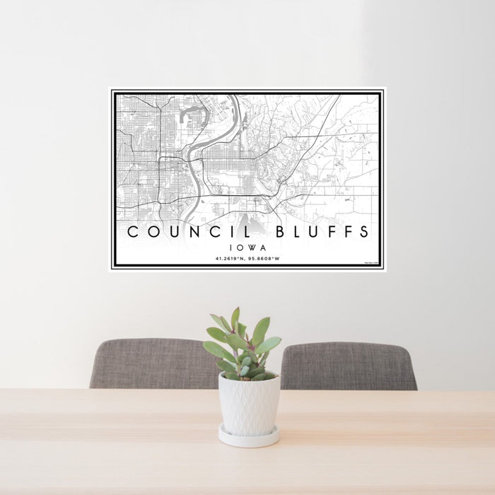 24x36 Council Bluffs Iowa Map Print Landscape Orientation in Classic Style Behind 2 Chairs Table and Potted Plant