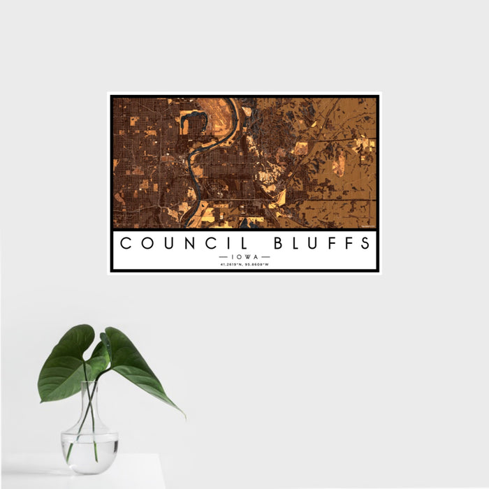 16x24 Council Bluffs Iowa Map Print Landscape Orientation in Ember Style With Tropical Plant Leaves in Water