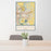 24x36 Council Bluffs Iowa Map Print Portrait Orientation in Woodblock Style Behind 2 Chairs Table and Potted Plant