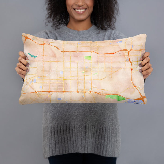 Person holding 20x12 Custom Covina California Map Throw Pillow in Watercolor