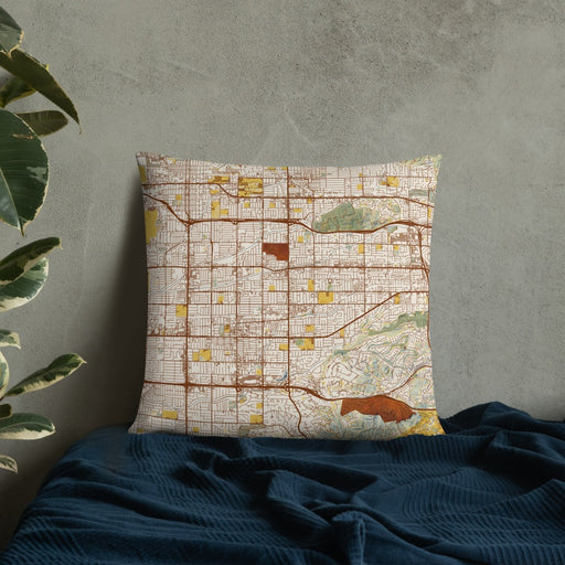 Custom Covina California Map Throw Pillow in Woodblock on Bedding Against Wall