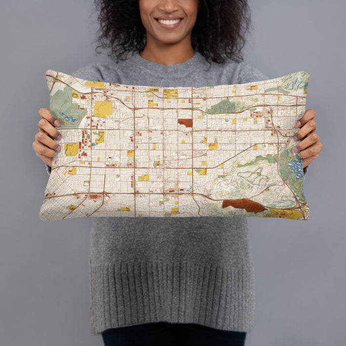 Person holding 20x12 Custom Covina California Map Throw Pillow in Woodblock