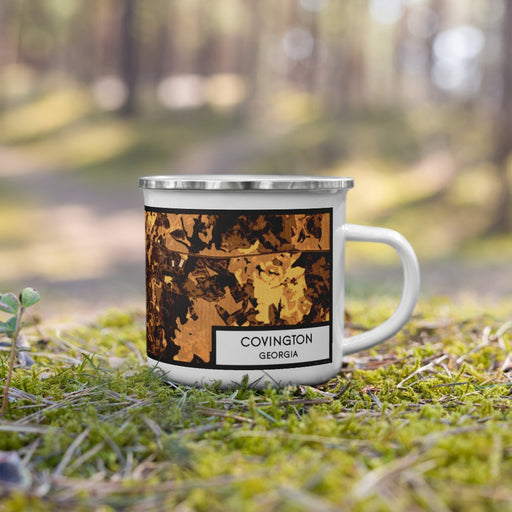 Right View Custom Covington Georgia Map Enamel Mug in Ember on Grass With Trees in Background