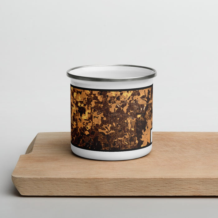 Front View Custom Covington Georgia Map Enamel Mug in Ember on Cutting Board