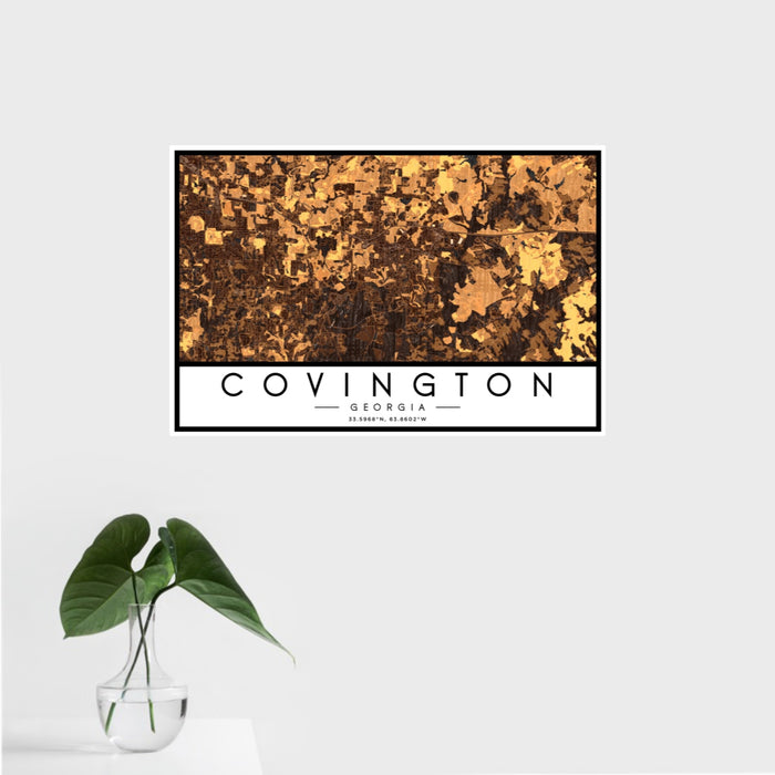 16x24 Covington Georgia Map Print Landscape Orientation in Ember Style With Tropical Plant Leaves in Water