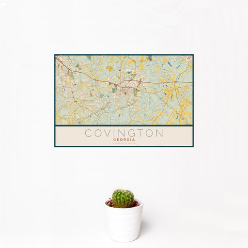 12x18 Covington Georgia Map Print Landscape Orientation in Woodblock Style With Small Cactus Plant in White Planter