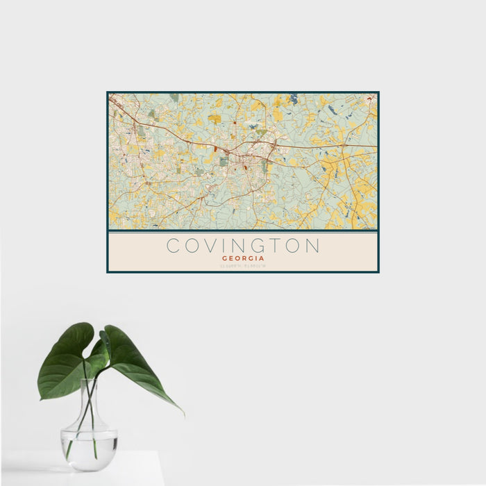 16x24 Covington Georgia Map Print Landscape Orientation in Woodblock Style With Tropical Plant Leaves in Water