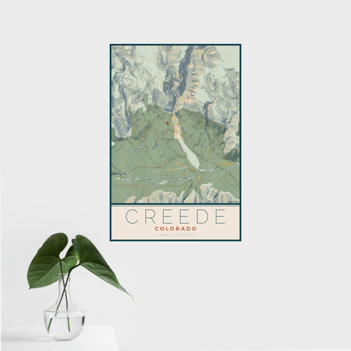 16x24 Creede Colorado Map Print Portrait Orientation in Woodblock Style With Tropical Plant Leaves in Water