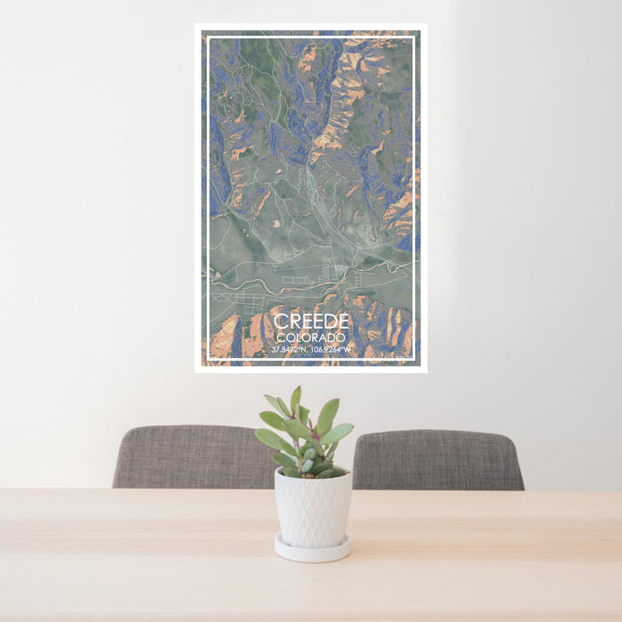 24x36 Creede Colorado Map Print Portrait Orientation in Afternoon Style Behind 2 Chairs Table and Potted Plant