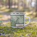 Right View Custom Creede Colorado Map Enamel Mug in Woodblock on Grass With Trees in Background