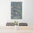 24x36 Crested Butte Colorado Map Print Portrait Orientation in Afternoon Style Behind 2 Chairs Table and Potted Plant