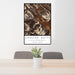 24x36 Crested Butte Colorado Map Print Portrait Orientation in Ember Style Behind 2 Chairs Table and Potted Plant