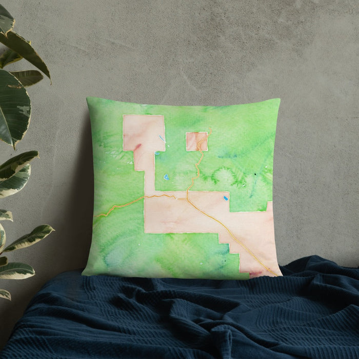 Custom Crested Butte Colorado Map Throw Pillow in Watercolor on Bedding Against Wall