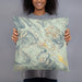 Person holding 18x18 Custom Crested Butte Colorado Map Throw Pillow in Woodblock