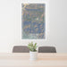 24x36 Crestline California Map Print Portrait Orientation in Afternoon Style Behind 2 Chairs Table and Potted Plant