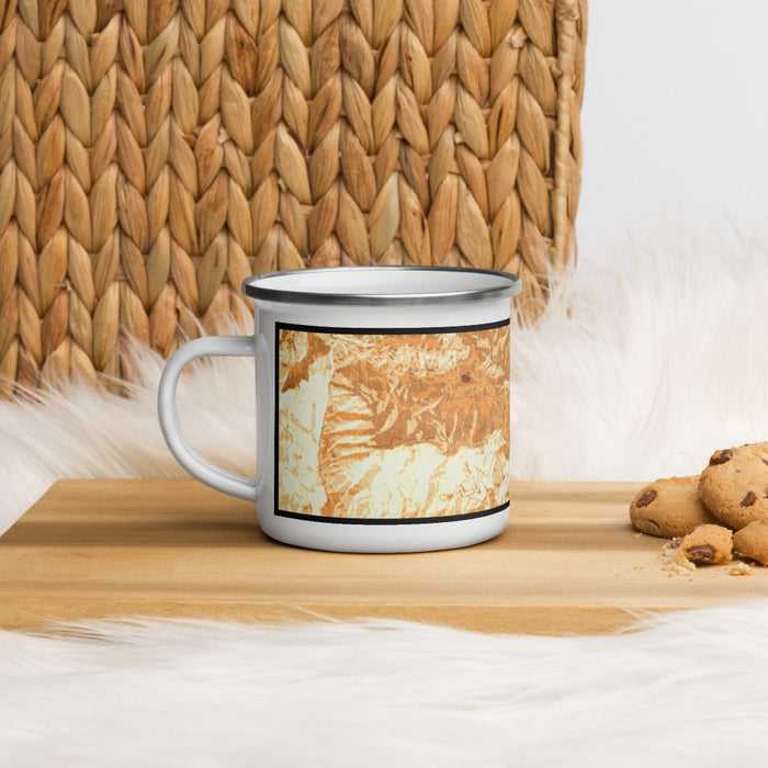 Left View Custom Crestline California Map Enamel Mug in Ember on Table Top