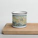 Front View Custom Crestline California Map Enamel Mug in Woodblock on Cutting Board