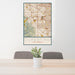 24x36 Cupertino California Map Print Portrait Orientation in Woodblock Style Behind 2 Chairs Table and Potted Plant