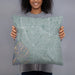 Person holding 18x18 Custom Cupertino California Map Throw Pillow in Afternoon