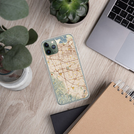 Custom Cupertino California Map Phone Case in Woodblock on Table with Laptop and Plant