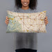 Person holding 20x12 Custom Cupertino California Map Throw Pillow in Woodblock