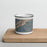 Front View Custom Custer Gallatin National Forest Map Enamel Mug in Afternoon on Cutting Board