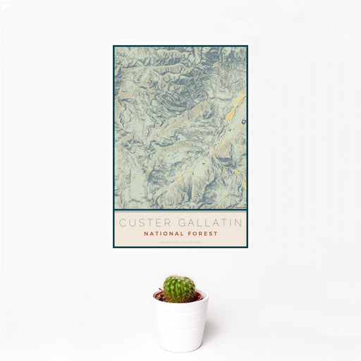 12x18 Custer Gallatin National Forest Map Print Portrait Orientation in Woodblock Style With Small Cactus Plant in White Planter