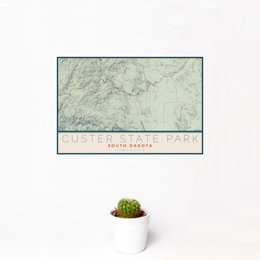 12x18 Custer State Park South Dakota Map Print Landscape Orientation in Woodblock Style With Small Cactus Plant in White Planter