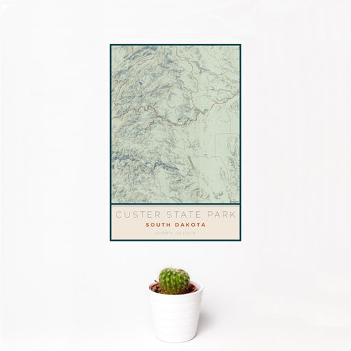 12x18 Custer State Park South Dakota Map Print Portrait Orientation in Woodblock Style With Small Cactus Plant in White Planter