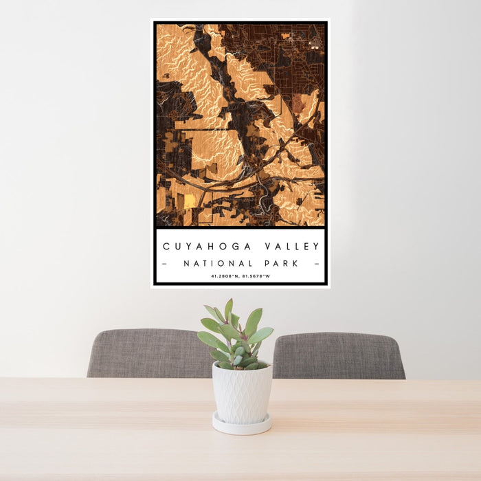 24x36 Cuyahoga Valley National Park Map Print Portrait Orientation in Ember Style Behind 2 Chairs Table and Potted Plant