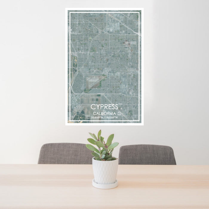 24x36 Cypress California Map Print Portrait Orientation in Afternoon Style Behind 2 Chairs Table and Potted Plant