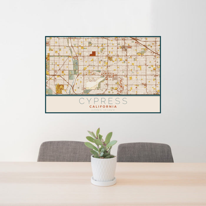24x36 Cypress California Map Print Lanscape Orientation in Woodblock Style Behind 2 Chairs Table and Potted Plant