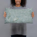 Person holding 20x12 Custom Cypress California Map Throw Pillow in Afternoon