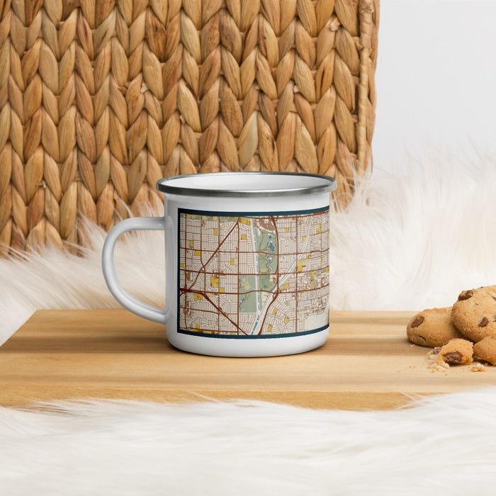 Left View Custom Cypress California Map Enamel Mug in Woodblock on Table Top