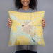 Person holding 18x18 Custom Dalhart Texas Map Throw Pillow in Woodblock