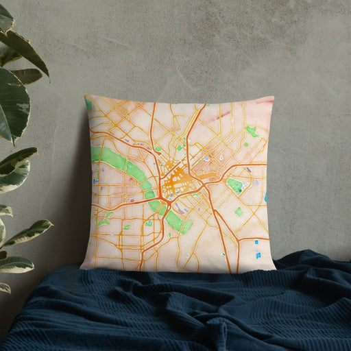 Custom Dallas Texas Map Throw Pillow in Watercolor on Bedding Against Wall