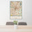 24x36 Dallas Texas Map Print Portrait Orientation in Woodblock Style Behind 2 Chairs Table and Potted Plant