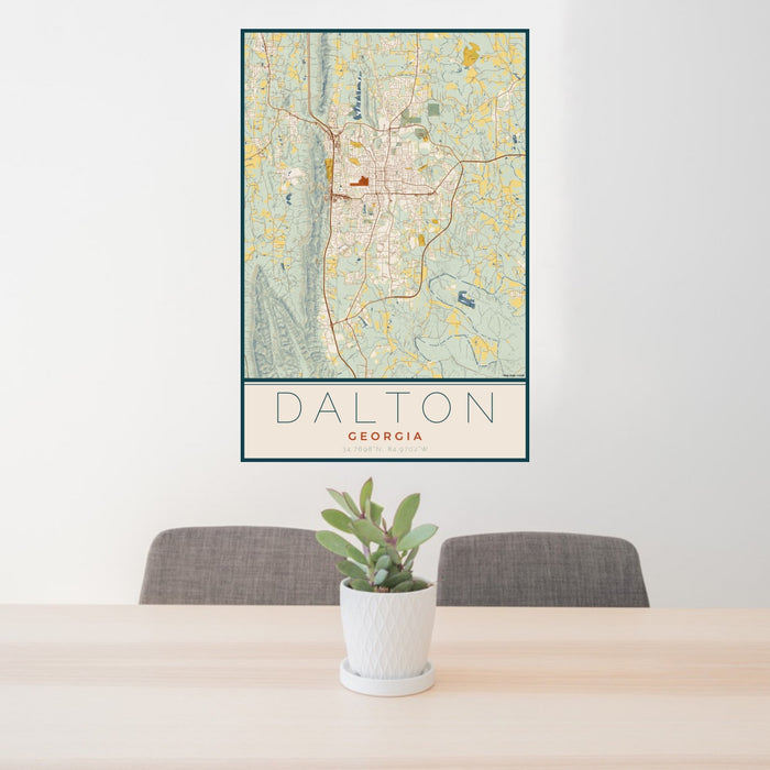 24x36 Dalton Georgia Map Print Portrait Orientation in Woodblock Style Behind 2 Chairs Table and Potted Plant
