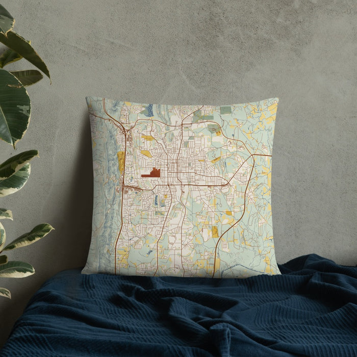 Custom Dalton Georgia Map Throw Pillow in Woodblock on Bedding Against Wall