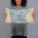 Person holding 20x12 Custom Daly City California Map Throw Pillow in Afternoon