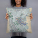 Person holding 18x18 Custom Daly City California Map Throw Pillow in Afternoon