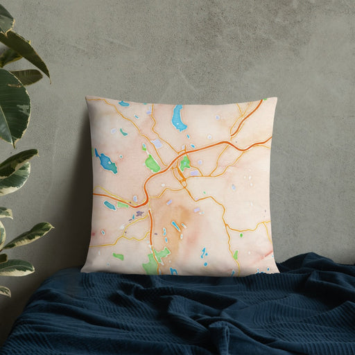 Custom Danbury Connecticut Map Throw Pillow in Watercolor on Bedding Against Wall