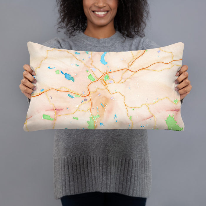 Person holding 20x12 Custom Danbury Connecticut Map Throw Pillow in Watercolor