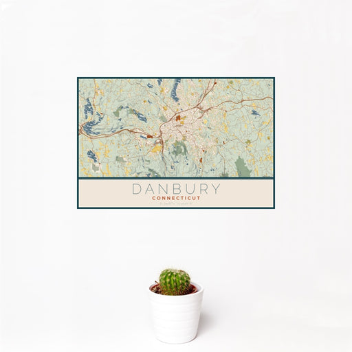 12x18 Danbury Connecticut Map Print Landscape Orientation in Woodblock Style With Small Cactus Plant in White Planter