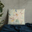 Custom Danbury Connecticut Map Throw Pillow in Woodblock on Bedding Against Wall
